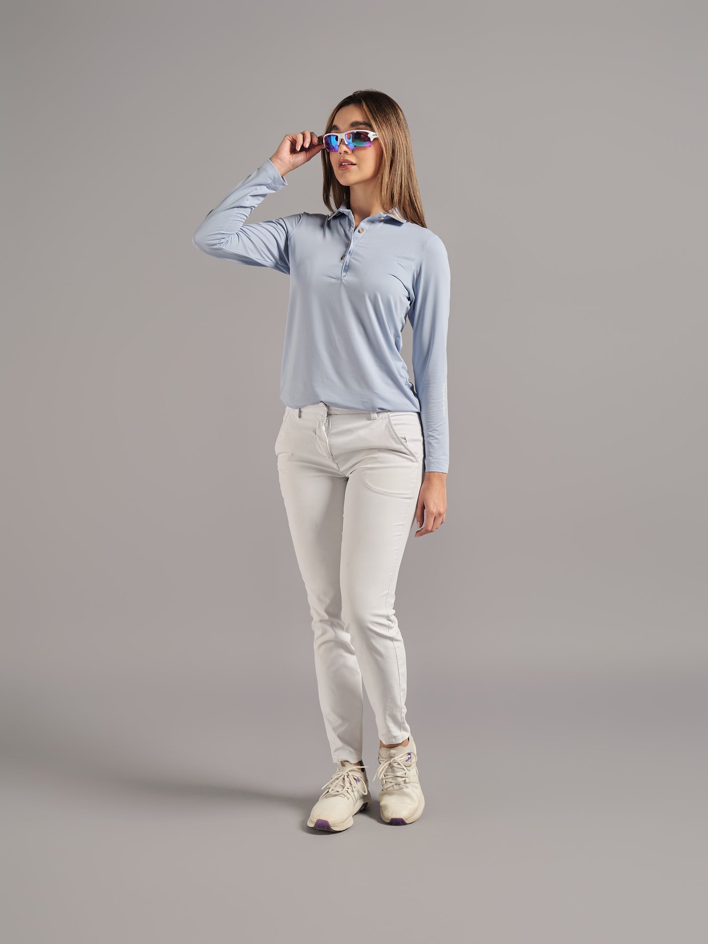 Polo Manga Larga Azul Claro logos crema – (Mujer)